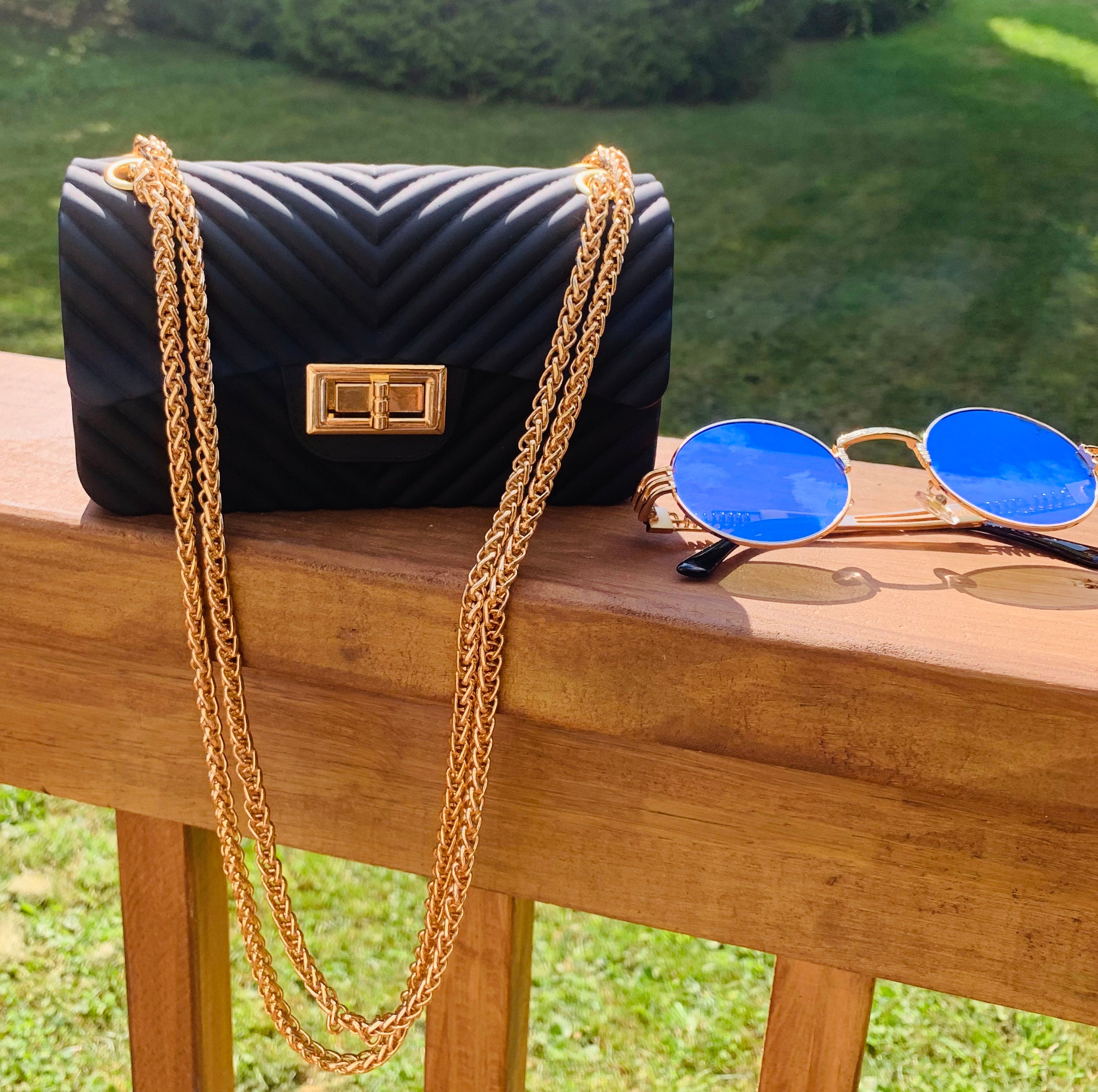 The best handbag, 2020 handbags. black and gold bag. gold chain bag. 